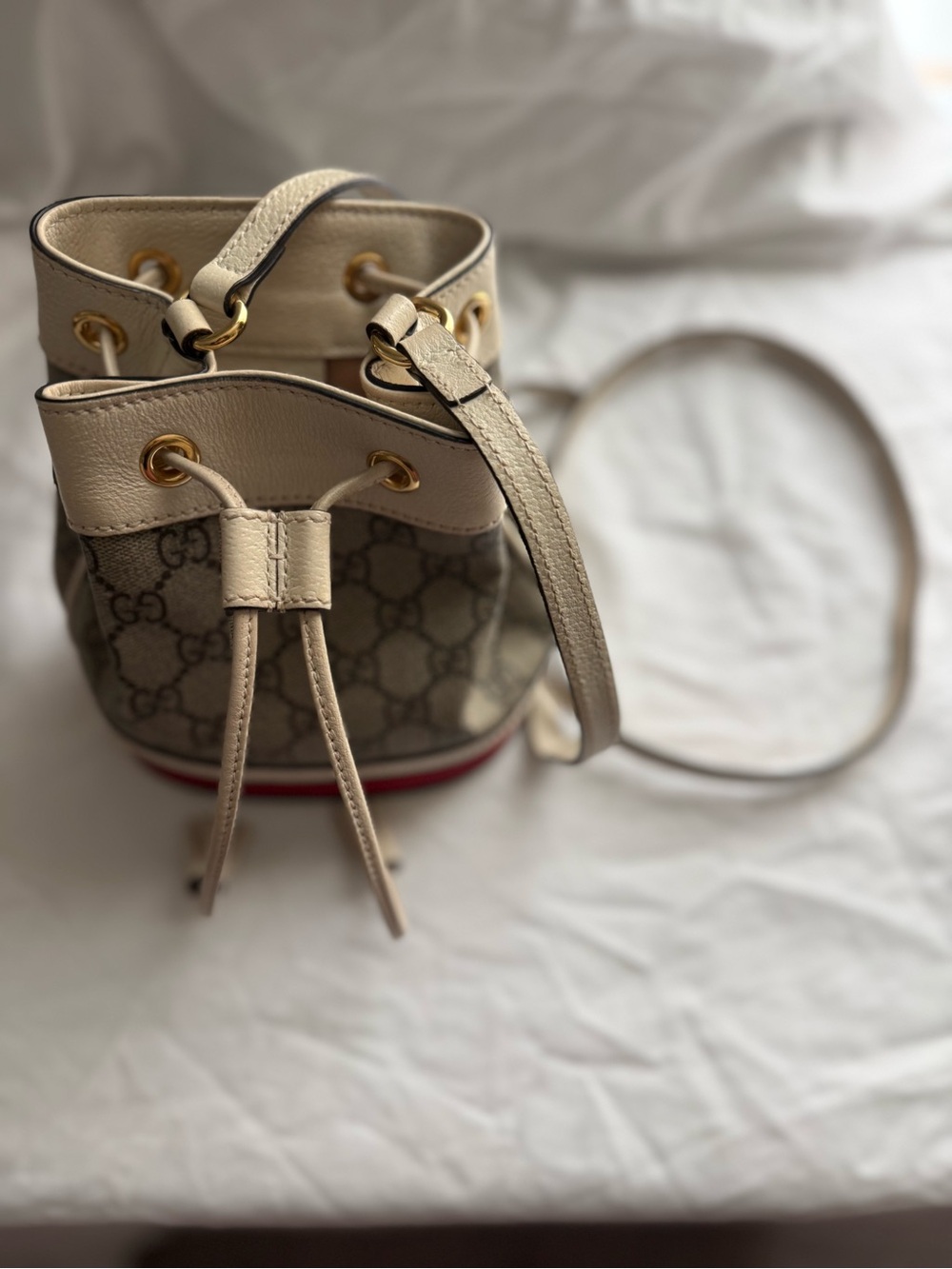 Gucci GG Canvas Mini Drawstring Bucket Bag in Cream and Brown
